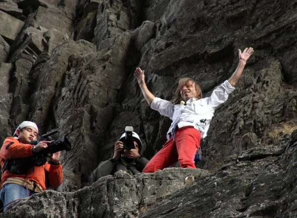 depositphotos_245371934-stock-photo-alain-robert-right-known-french